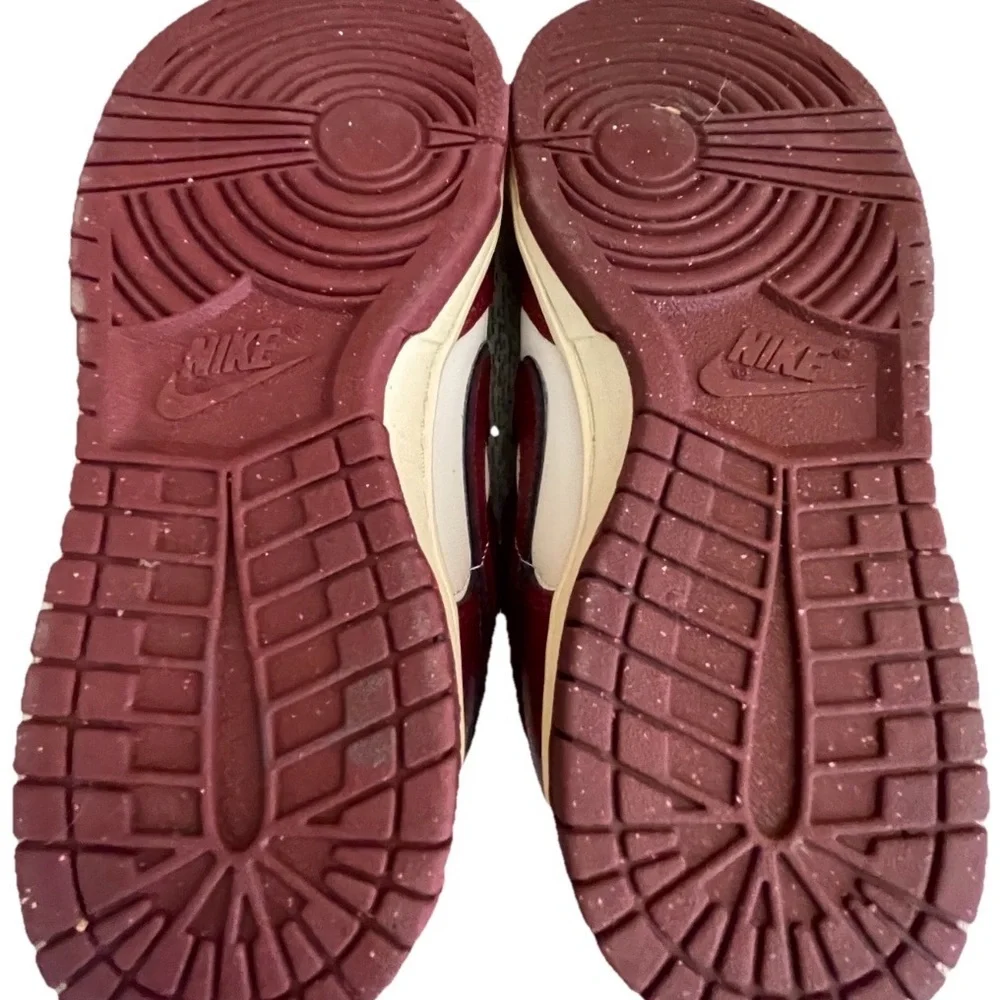 Nike Women’s White and Burgundy Sneakers with Gold Accents
